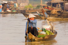 Woman In Boat, Chong Kneas Floating Village, Tonle Sap Lake, Siem Reap, Cambodia