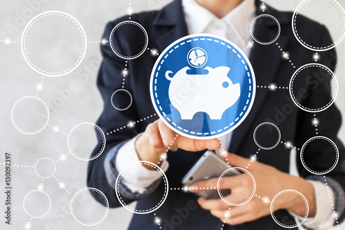 Businessman Presses Piggy Bank Icon With Clock Symbol