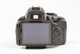 Fototapeta  - Black unbranded DSLR camera isolated on white background