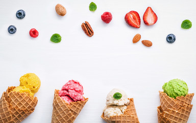 Fototapete - Colorful ice cream with cones and various fruits raspberry ,blue