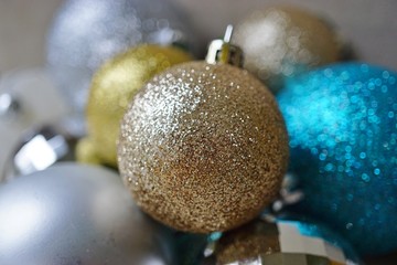 Gold and silver glittery Christmas holiday decorative round ornaments