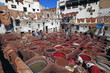 © robertharding - Chouwara traditional leather tannery in Old Fez, vats for tanning and dyeing leather hides and skins, Fez, Morocco
