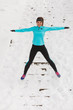 © Voyagerix - Young girl jumping on the snow.