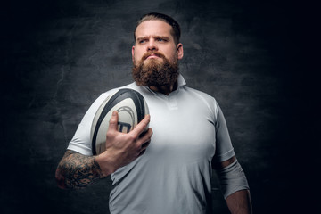 Wall Mural - Bearded rugby player.