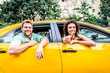 © oneinchpunch - Couple on a taxi in Manhattan