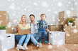 © Syda Productions - happy family with boxes moving to new home