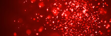 Glitter Banner: Festive Twinkling Star-shaped Red Glitter With Bokeh Effect In Front Of A Dark Red Background