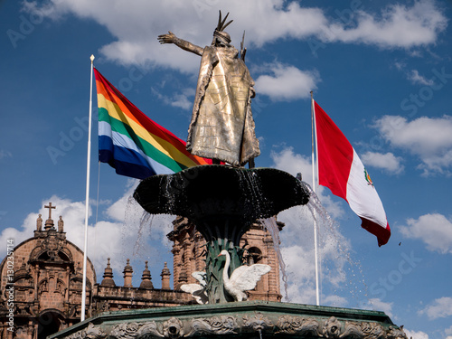 Fotografie, Obraz Manco Capac water fountain golden statue in Cusco, Peru.