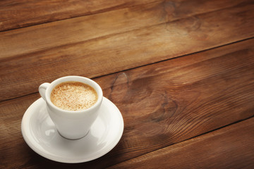 Sticker - Cup of coffee on wooden background