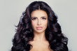 © millaf - Healthy Woman with Clear Skin and Long Curly Hair. Perfect Face