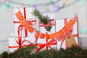 Wall Mural - Group Christmas white gift boxes with red ribbons and garland Merry Christmas.