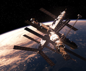 Wall Mural - space station orbiting earth