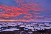 Fiery Sunset Over A Snow Covered Gormire Lake From Sutton Bank On The Edge Of The North Yorkshire Moors, Yorkshire