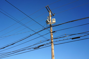 power pole under blue sky