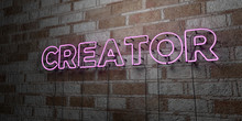 CREATOR - Glowing Neon Sign On Stonework Wall - 3D Rendered Royalty Free Stock Illustration.  Can Be Used For Online Banner Ads And Direct Mailers..