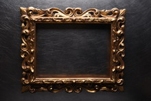 Old Antique Gold Wooden Frame On Grey Metal Background