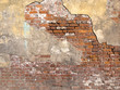 © dmitr1ch - Old damaged brick wall and plaster