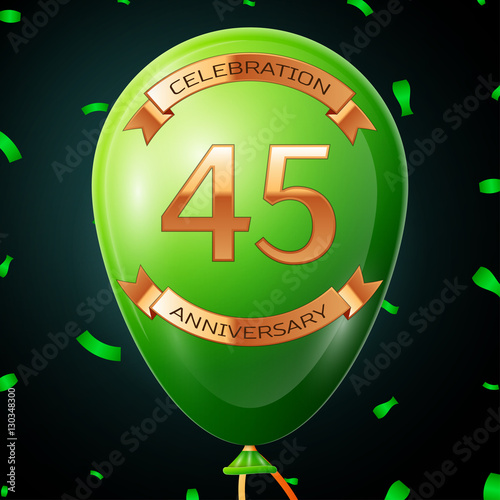 Photographie Green balloon with golden inscription forty five years anniversary celebration and golden ribbons, confetti on black background