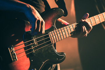 Wall Mural - Vintage toned bass guitar player