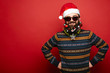 © kegfire - man in Santa Claus hat and sunglasses