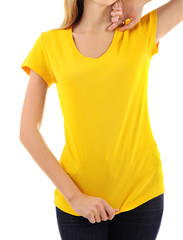 Young woman in blank yellow t-shirt on white background, close up