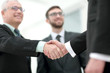 © ASDF - Concept of partnership - handshake of business partners