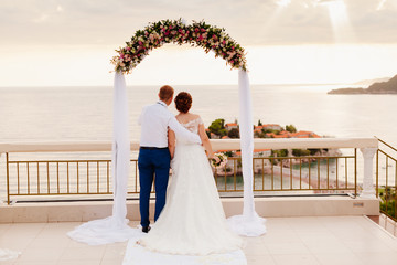 destination wedding couple at sunset