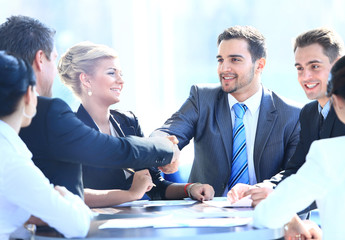 Sticker - Two business colleagues shaking hands during meeting