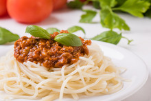 Spaghetti Bolognese On White Table