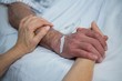 © WavebreakmediaMicro - Doctor consoling a patient