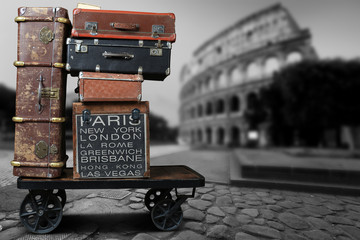 Luggage tourists with big suitcases on a cart