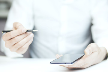 Poster - Mobile phone on man hand