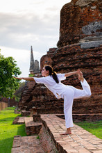 Yoga Practitioner At A Thai Temple