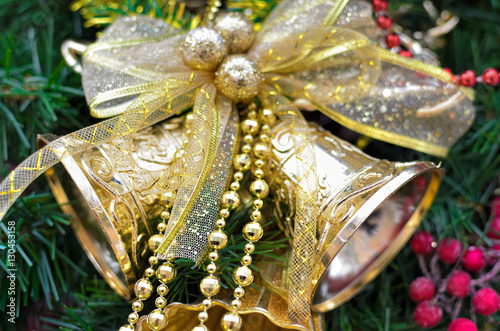 Fényképezés Branches of a Christmas tree decorated with jingle bells