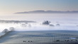 © robertharding - Beeston Castle and Peckforton Hills rise above a blanket of mist and fog covering the Cheshire plain on a frosty winters morning, Cheshire