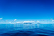 © robertharding - Blue sky and ocean with islands in the background, Queensland