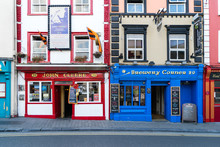 Colorful Building Fronts Of Traditional Beer Pubs In Kilkenny, County Kilkenny, Leinster, Republic Of Ireland