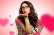Quirky cute woman blowing kiss heart shapes fun funny conceptual love and romance