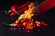© Igor Normann - Knife and red chilli pepper