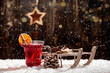 canvas print picture - Weihnachtsstern aus Holz. Grlühwein und Schlitten im Laternenlicht