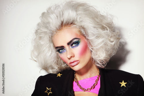 Poster Portrait of young beautiful platinum blond woman with bold eyebrows and 80s styl