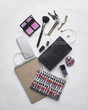 © Cavan Images - Overhead view of personal accessories on white background