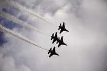 Low Angle View Of Military Airplanes Flying In Sky During Airshow