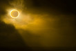© Cavan Images - View of solar eclipse in sky during foggy weather