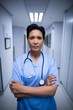 © WavebreakMediaMicro - Portrait of female nurse standing in corridor