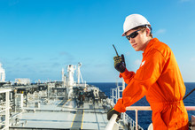 Deck Officer Using Radio On The Board Of A Tanker.