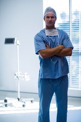 Poster - Portrait of male nurse standing in corridor