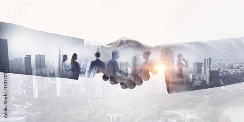 Cuadros en Lienzo Partners shaking hands . Mixed media