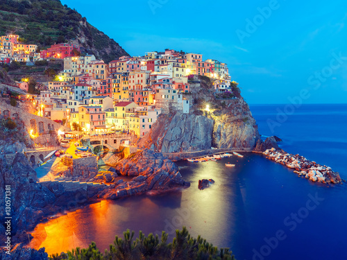 Cuadros en Lienzo Aerial night view of Manarola fishing village, seascape in Five lands, Cinque Terre National Park, Liguria, Italy