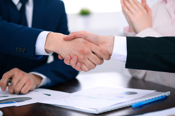 Business people shaking hands finishing up a meeting